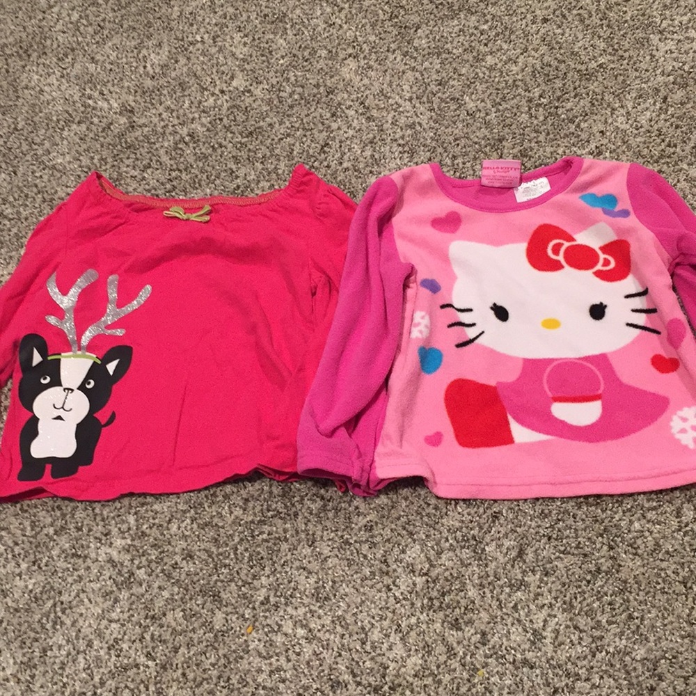 Set of two long sleeve shirts.